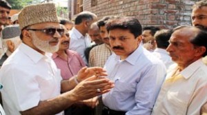 Minister for Rural Development, Ali Mohd Sagar interacting with officers at Srinagar on Tuesday.