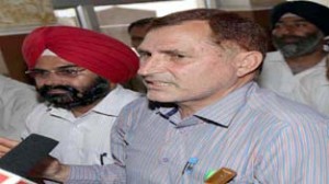 JCC leader Mohd Gafoor Dar addressing press conference at Jammu on Tuesday. -Excelsior/Rakesh