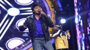 Jammu’s Anmol Jaswal displaying his singing talent during an Indian Idol show at Sony TV.