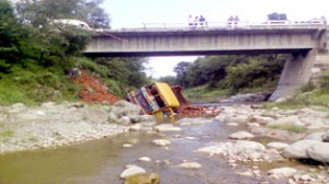 A tipper which fell into nallah from bridge at Rasalyaot near Sunderbani on Sunday.