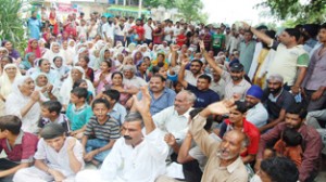 People protesting at Chak Salaria in Samba district on Tuesday. —Excelsior/Gautam
