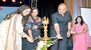 Union Minister for Health, Ghulam Nabi Azad lighting traditional lamp during convocation of VLCC Institute at New Delhi on Friday.
