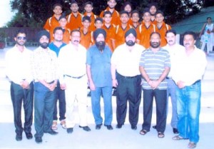 Students holding trophies while posing for a photograph during Science Exhibition.