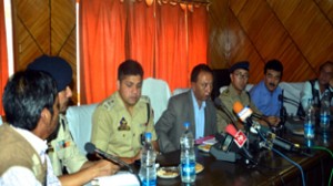DC Fida Hussain and SSP Sujit Kumar addressing a press conference at Kargil on Saturday.