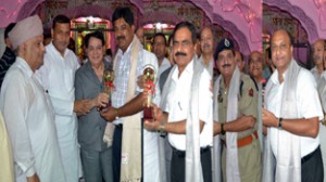 Chairman Legislative Council, Amrit Malhotra, Minister for PHE, Sham Lal Sharma and MLA Ashok Khajuria felicitating officers and activists during a function at Jammu.