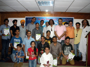 Winners of musical programme posing for photograph at K L Saigal hall on Sunday.