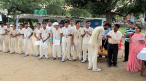 M Laxmi Narayana, Principal, KV-2 Jammu Cantt presenting medals to the winners in Jammu on Friday.