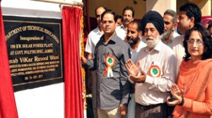 Minister of State for Power, Vikar Rasool inaugurating Solar Power Plant at Govt Polytechnic, Bikram Chowk on Monday.