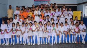 Winners of Painting Competition organized by Career Abacus posing for a group photograph on Saturday.