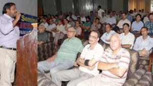 A penalist speaking at a seminar at Jammu Club on Sunday. —Excelsior/Rakesh