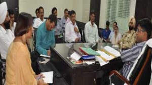 District Development Commissioner Ajeet Kumar Sahu chairing a meeting at Jammu on Friday.