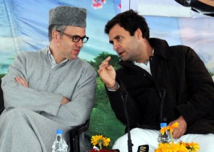 Chief Minister, Omar Abdullah and vice president Congress Party, Rahul Gandhi talking to each other at a function of women self-help groups in Budgam district on Thursday. —Excelsior/Amin War