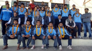 Selected wrestlers posing alongwith members and officials of J&K State Sports Council in Jammu on Saturday.