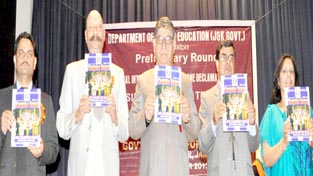 Dignitaries releasing College Magazine at GCW Gandhi Nagar on Monday.