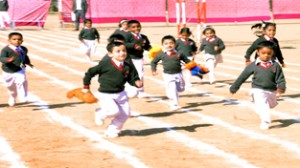 Children sweating-it-out during Annual Sports Meet organized by Dogra HSS Shastri Nagar on Thursday.