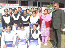Students posing for a photograph at Govt Girls Higher Secondary School Sunderbani in Rajouri on Tuesday.