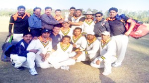 Jubilant JU team players posing for a photograph after defeating Jalgaon University on Friday.