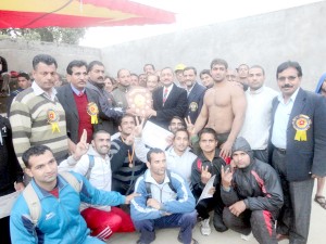 Wrestlers posing alongwith DG Sports Navin Aggarwal and other dignitaries in Jammu on Friday.