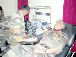 Army officer donating blood during a camp at Udhampur.