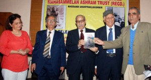 Shri Ramkrishan Mahasammelan Ashram Trust members releasing book at Press Club on Monday. -Excelsior/Rakesh