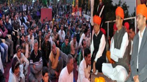 Minister for PHE, Sham Lal Sharma and MP Madan Lal Sharma during a religious gathering in Akhnoor tehsil on Monday.