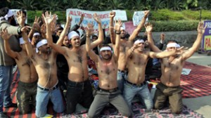 Warden candidates holding protest demonstration at Jammu on Saturday. -Excelsior/Rakesh