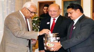 Governor N N Vohra contributing towards Armed Forces Flag Day Fund at Raj Bhavan on Saturday.