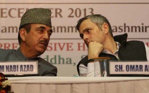 Chief Minister Omar Abdullah talking to Union Minister for Health and Family Welfare, Ghulam Nabi Azad during the AROGYA Mela at Parade Ground in Jammu on Saturday. (UNI)
