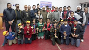 Shuttlers posing for a group photograph  alongwith MLC Vijay Bakaya at Indoor Complex in MA Stadium.          -Excelsior/ Rakesh