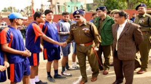 DIG Jammu-Samba-Kathua Range, Shakeel Ahmad Beig shaking hands with the Volleyball players after inaugurating Range Police Volleyball Friendship Cup at Akhnoor.