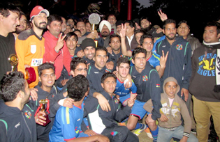 Jubilant JK Bank team posing for a photograph alongwith Devender Singh Rana, NC Provincial chief in Jammu on Sunday. -Excelsior/Rakesh