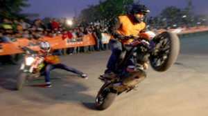 Bikers performing stunts during ‘Stunt show’ organised by KTM at Jammu. —Excelsior/Rakesh