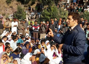 Minister of State for Revenue, Aijaz Ahmad Khan addressing public gathering in Reasi district on Wednesday.