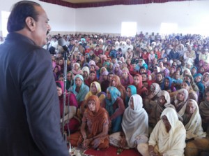 Former Minister and MLA Vijaypur, Surjit Singh Slathia addressing a gathering at Vijaypur on Wednesday.