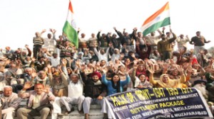 PoJK refugees raising slogans in support of their demands during a protest demonstration at Jammu on Sunday. -Excelsior/Rakesh