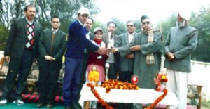 Dignitaries distributing prize to a winner during a function at Jammu on Saturday.