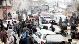 Villagers staging protest against the Power Development Department (PDD). -Excelsior/Younis Khaliq