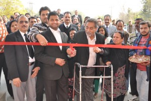 Specially-abled advocates, Suraj Singh and Rajeev Bhushan Sharma inaugurating elevator at Court Complex Janipur on Friday.