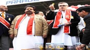 Chief Minister, Omar Abdullah alongwith Minister for Housing, Raman Bhalla announcing winners of Raffle draw on conclusion of Red Cross Mela on Sunday.