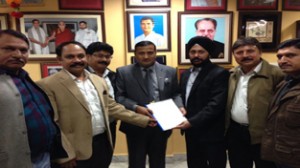 Diploma Engineers Association submitting a memorandum of demands to Minister for PHE, Sham Lal Sharma at Jammu on Thursday.