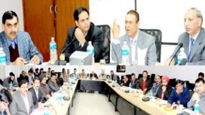 Minister for CA&PD Ch Mohd Ramzan and MoS Vikar Rasool chairing a meeting at Jammu on Monday.