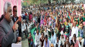 Minister for Planning Ajay Kumar Sadhotra addressing public gathering at Jaswan on Sunday.