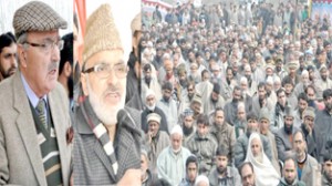 Minister for Panchayati Raj Ali Mohd Sagar and MLA Dr Mustafa Kamaal addressing public gathering at Ganderbal on Monday.