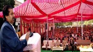 Minister for Housing Raman Bhalla addressing public gathering at Gangyal on Friday.