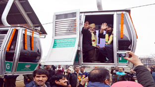 Minister for Tourism Ghulam Ahmad Mir and Minister for Rural Development Ali Mohammad Sagar inaugurating Makhdoom Sahib ropeway at Srinagar on Monday. -Excelsior/Amin War