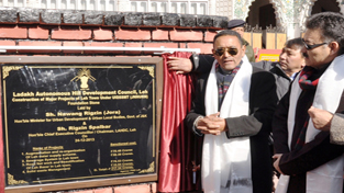 Minister for Urban Development, Nawang Rigzin Jora and CEC Rigzin Spalbar unveiling foundation stone of major projects in Leh town on Tuesday.