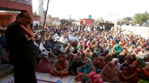 NC MLA S S Slathia addressing public meeting at Vijaypur on Sunday.