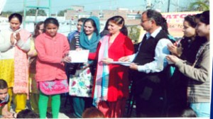 Best performers being awarded certificates in an Art Camp organised by Satchel at Jammu on Sunday.