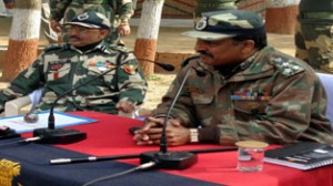 DIG BSF addressing a meeting of farmers in village Sai in R S Pura area on Tuesday.