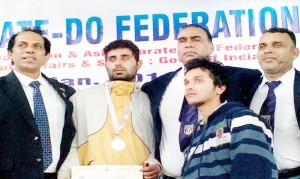 Anchal being felicitated by dignitaries during 26th All India National Karate-Do Championship at Tata Nagar in Jamshedpur.